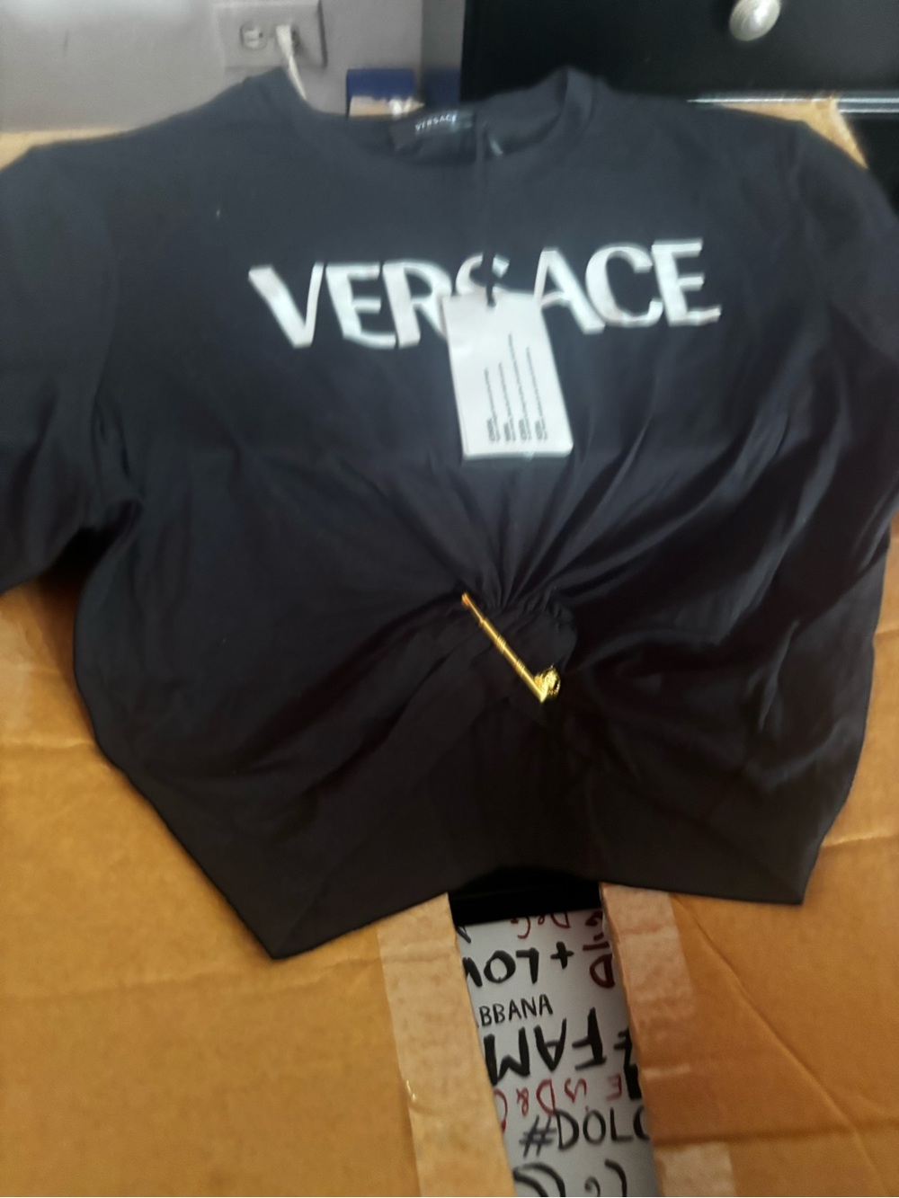 Versace Black Tee with White Logo and Gold Pin Accent